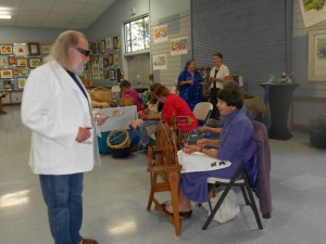 Volunteers demonstrating at the Harvest Fair 10/11