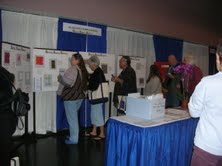 Weavers perusing samples at Conference