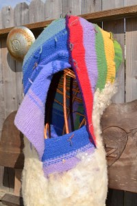 Largest Pod 39" long, It offers a view of the willow armature, colorful felted knit and needle felted raw wool.