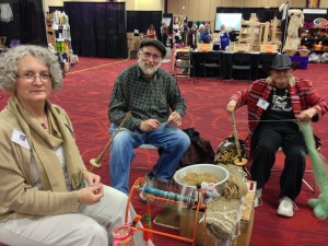 Susan giving a spinning demonstration onHelen Pope's Columbine wheel