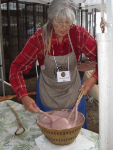 Lois Conner Bohna cooking acorn porridge in her grandmother's basket