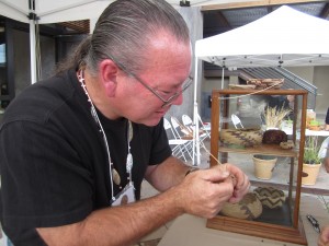 Clint McKay demonstrates how sedge is split and sized.