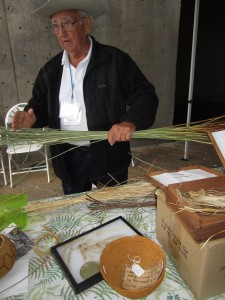 Justin Farmer discusses the juncus grass used in Ipai baskets.