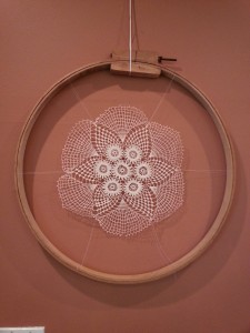Family keepsake doily suspended in an embroidery hoop. Tena Frazier