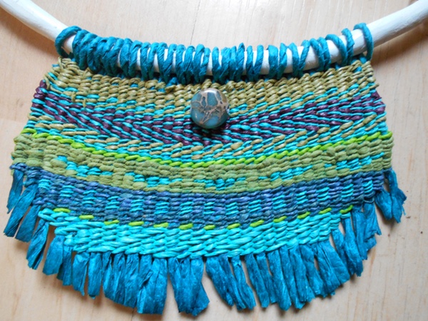 Woven pendant of spun paper yarns, blue and green stripes