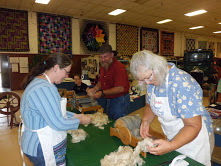 2016 Sheep to Shawl- Rebecca Salstrom, Ben Cohoon and Debra Pecaut are preparing to card fiber